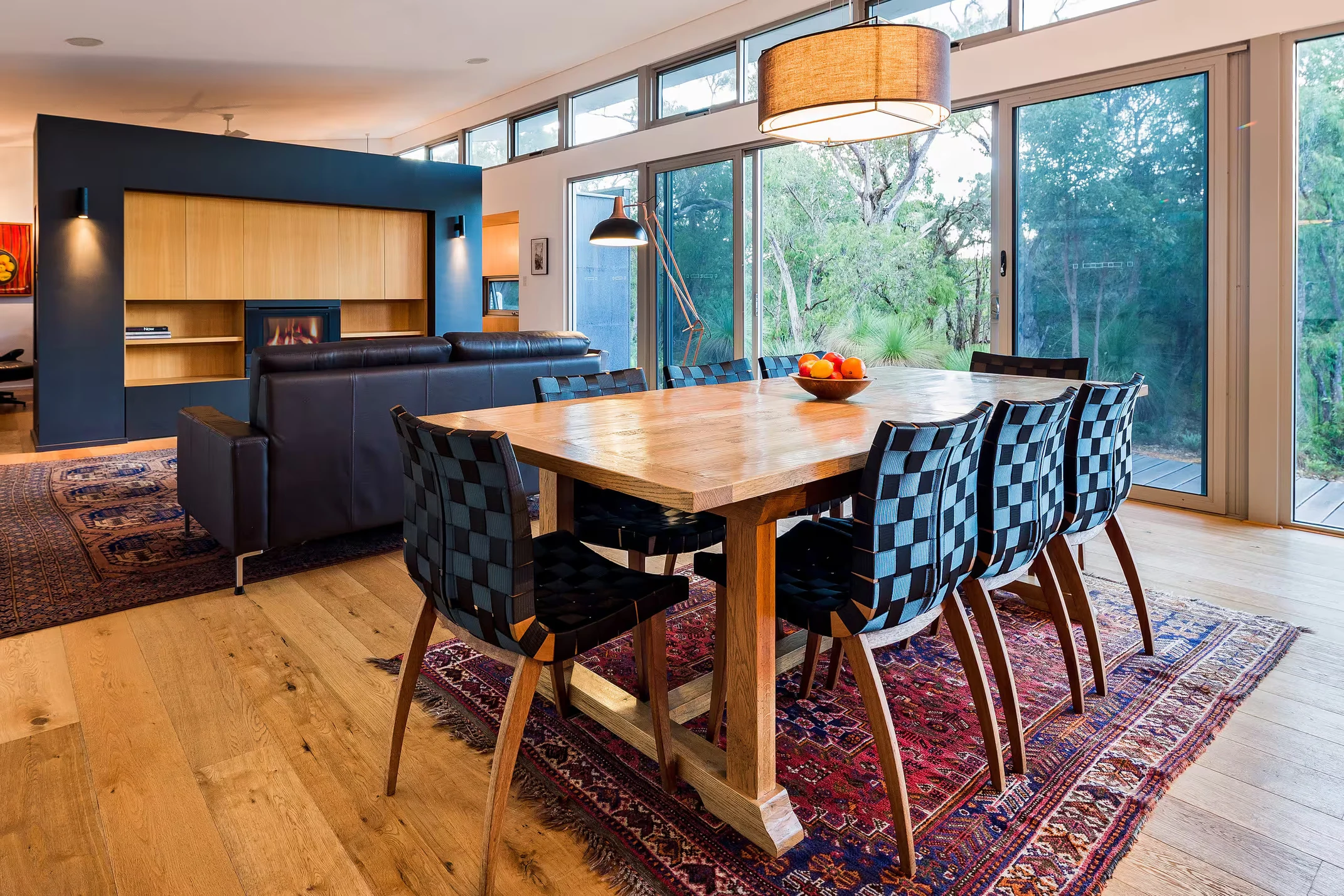 Injidup Sanctuary's dining and living area with native bush views